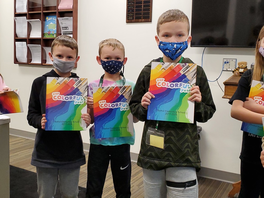 Students with Yearbooks Image